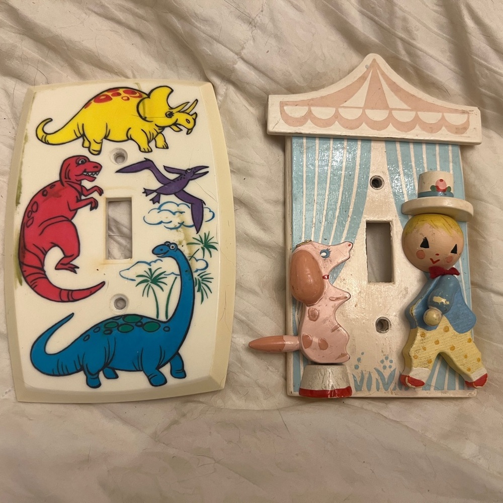 2 vintage light switch plates